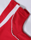 A red polo shirt featuring white accent details and a logo on the collar area.