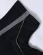 A black polo shirt with grey detailing on the collar and sleeves, featuring a logo.