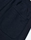 Dark blue kids' poly/cotton terry sweat pants featuring a single patch pocket on the side.