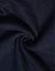 A close-up of navy blue poly/cotton terry fabric, showcasing its soft and stretchy texture. Features a logo.