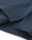 A navy cotton stretch polo shirt with detailed stitching and a subtle logo.