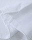 A close-up of a white cotton stretch polo shirt, featuring stitched hem and sleeve details. It has a logo.