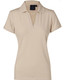 A beige ladies' polo shirt featuring a collar and a logo. Ideal for casual or sporty wear.
