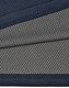 A close-up of a two-tone polo shirt featuring a navy blue top section and a grey, dotted underlay. The fabric is textured and breathable.