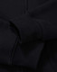 A black full-zip fleecy hoodie with a smooth fabric texture and a close-up view of the sleeve.