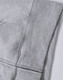 A grey full-zip fleecy hoodie featuring a pocket and a logo. Ideal for casual wear.