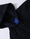 A ladies' full-zip fleecy hoodie in black, featuring a hood and a logo on the interior label.