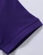 A close-up of a purple polo shirt sleeve, featuring a branded logo and textured fabric.