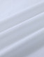 A close-up of white cotton fabric with soft, smooth texture, featuring natural wrinkles and folds.