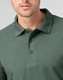 A green men's cotton stretch polo shirt featuring a classic collar and button placket, with a logo on the chest.
