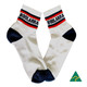 Premium cotton sports quarter socks featuring white and navy colours with a striped design and a logo.