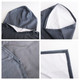 A grey hooded change towel made of 100% microfibre featuring a soft inner lining and stitched seams, with a logo present.