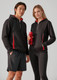 A unisex black hoodie with red accents, featuring a logo, worn by a male and female model.
