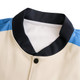 A unisex polyester scuba sublimated varsity jacket in cream with blue detailing and a black collar. Features a logo.