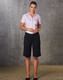Women's knee-length shorts in navy blue with a flexi waist, paired with a light pink collared shirt.