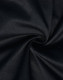 A close-up of a black fabric displaying a sturdy, textured weave, suitable for cargo work pants.