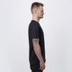 A black men's sports T-shirt displayed on a model from the side, showcasing its fit and design.