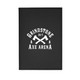 A black refillable journal featuring a logo with crossed axes and text. Ideal for office use or personal notes.