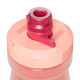A drink bottle in gradient shades of pink with a red spout and a logo on the cap.