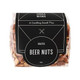 A clear plastic bag containing roasted beer nuts, showcasing a mix of light brown and tan nuts. The bag features a black label with branding.