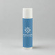 A cylindrical lip balm tube in light blue featuring a white cap and a logo.
