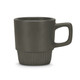 A stackable coffee mug in a matte dark grey finish with a textured base and a sturdy handle.