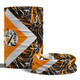 A tubular bandana in orange, black, and white with a dynamic pattern and a logo.
