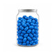 A clear can filled with glossy blue jelly beans, showcasing their vibrant colour and smooth texture.