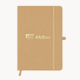 A beige A5 notebook with an elastic closure and a branding logo on the cover.