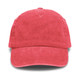 A vintage washed cap in a vibrant coral shade, featuring a curved brim and a logo on the front.