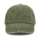 A vintage washed cap in olive green with a curved brim and a logo on the front.