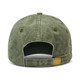 A vintage washed cap in olive green, featuring an adjustable strap and a discreet logo on the back.