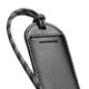 A black luggage tag with a textured surface and a patterned strap, featuring a branding logo.