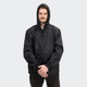 A black windbreaker jacket with a front pocket and hood, featuring a logo.