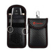 A black carbon fibre Faraday key pouch with red stitching, featuring a keychain and a clasp attachment.