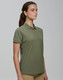 A olive green ladies' polo shirt made from ultrafine cotton pique, featuring a collar and buttoned placket.