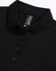 A black ultrafine cotton pique polo featuring a collar and buttons, with a logo present on the label.