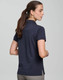 A navy ultrafine cotton pique polo worn by a woman, featuring a logo and a fitted design.