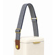 A cooler with a cream body features a navy and white striped shoulder strap and a brown leather accent.