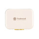 A cream-coloured cooler with a gold clasp and a logo. The design features a rectangular shape.