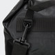 A black dry bag with a durable finish, featuring a secure clasp and adjustable strap for easy carrying.