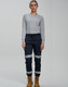 Cotton stretch drill cuffed work pants in navy blue with reflective tape, paired with a grey long-sleeve top.