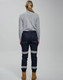 Cotton stretch drill cuffed work pants in navy, featuring reflective tape and a fitted design, viewed from the back.