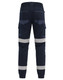 Cuffed work pants in navy with reflective tape and multiple pockets. Features an elastic waistband at the back.