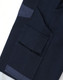Navy cotton stretch drill cuffed work pants featuring multiple pockets and a branding logo.