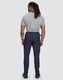 Flexi work pants in navy, featuring a flexible fit and water-repellent fabric. The model is seen from the back.