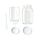 A clear plastic salad jar with a separate container, a fork, and two white lids.