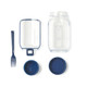 A transparent salad jar with a blue lid and fork, featuring a compartment for dressing.