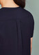 A women's rose tunic scrub top, featuring a sleek design with a pleat detail at the back. The fabric is dark navy.