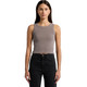 A model wearing a faded organic rib crop tank in a muted grey colour, paired with black high-waisted jeans.